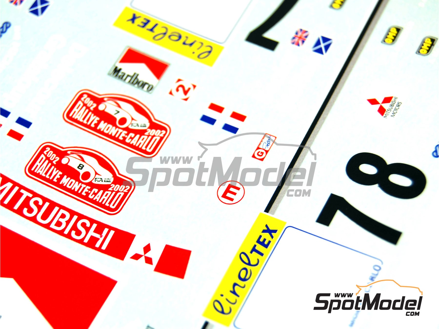 Image 12: Mitsubishi Lancer Evo VII patrocinado por Marlboro Ralli Art - Rally de Monte Carlo - Rallye Automobile de Monte-Carlo 2002 | Decoraci&oacute;n en escala&nbsp;1/24 fabricado por Renaissance Models (ref.&nbsp;TK24-130, tambien TK24/130)