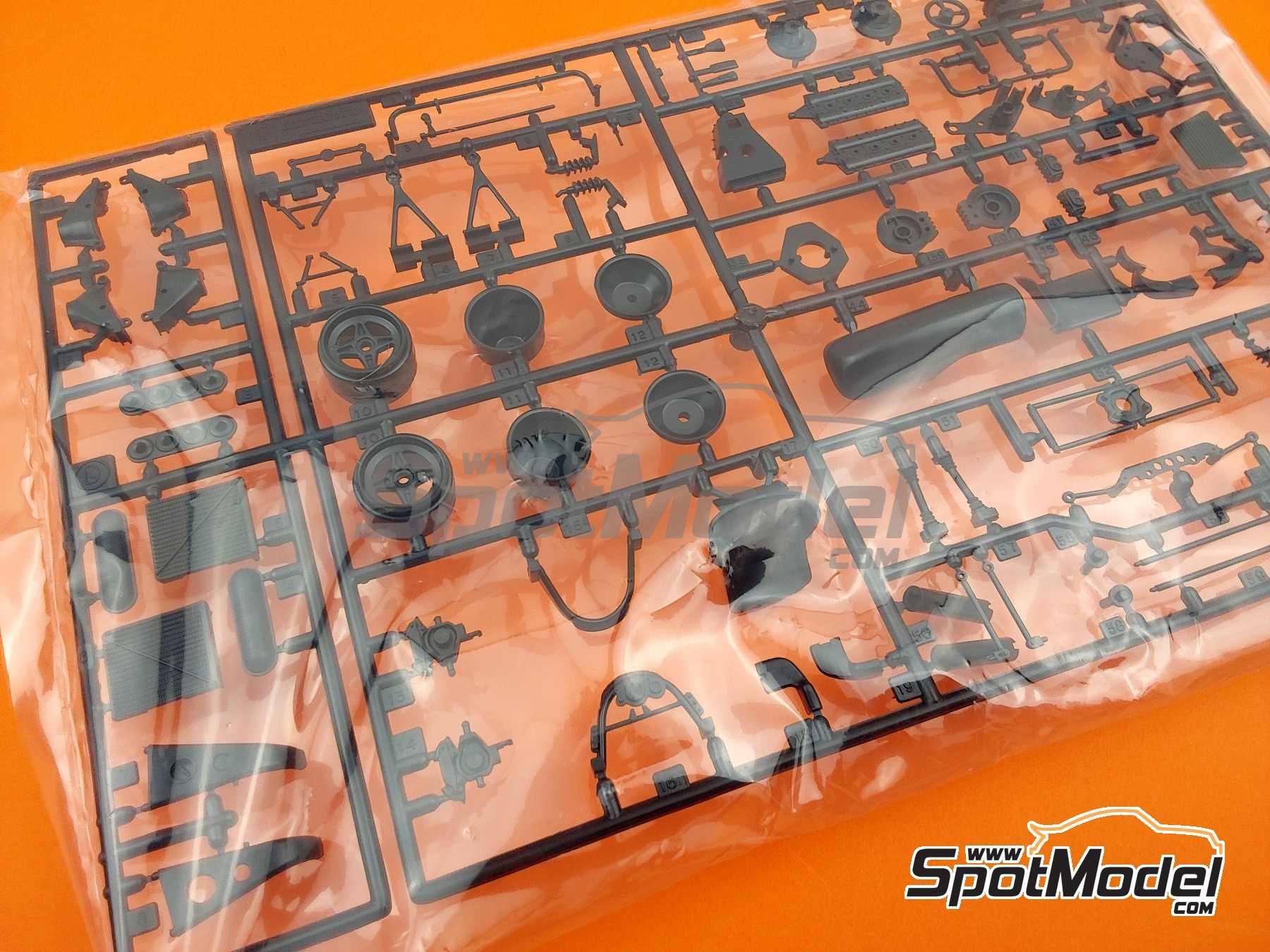 Image 9: Wolf Cosworth WR3 Theodore Racing Team sponsored by Car Stripes - Aurora AFX F1 Championship 1979 | Car scale model kit in 1/20 scale manufactured by Studio27 (ref.&nbsp;ST27-TRK007, also 4545310013921 and TRK007)