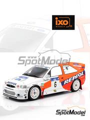 Ixo Models: Diecast model car 1/18 scale - Ford Escort WRC Ford Motor Co. Ltd. Team sponsored by Repsol #6 - Juha Kankkunen (FI) + Juha Repo (FI) - Acropolis Rally 1997 - metal parts, plastic parts and rubber parts